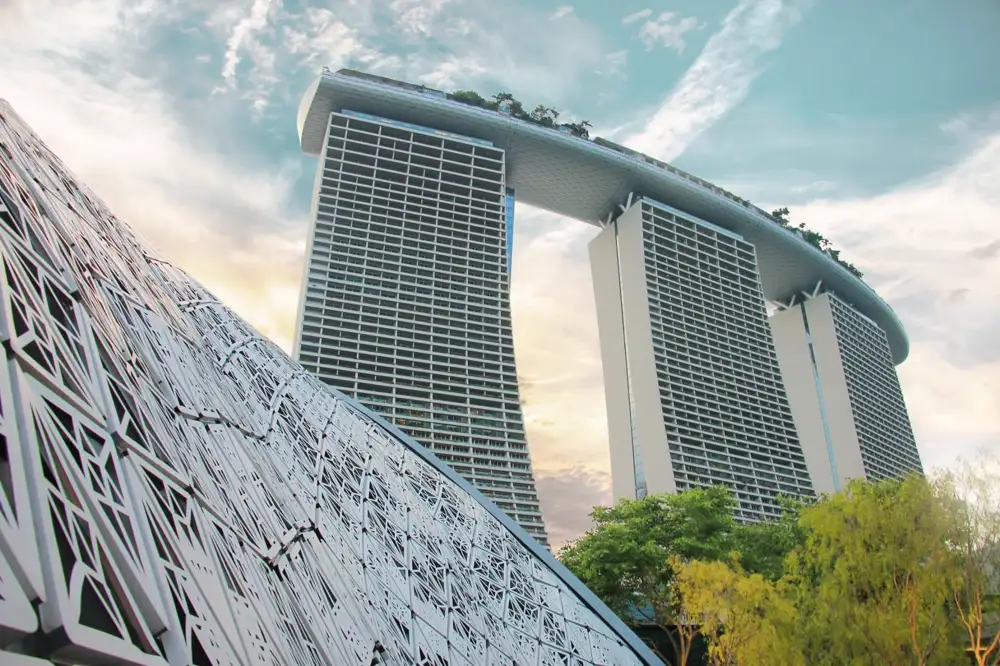 An infinity pool high above Singapore looking across Marina Bay to the financial district