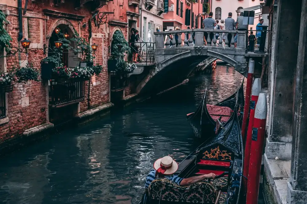 A Venetian palazzo water entrance with steps running down into the Grand Canal